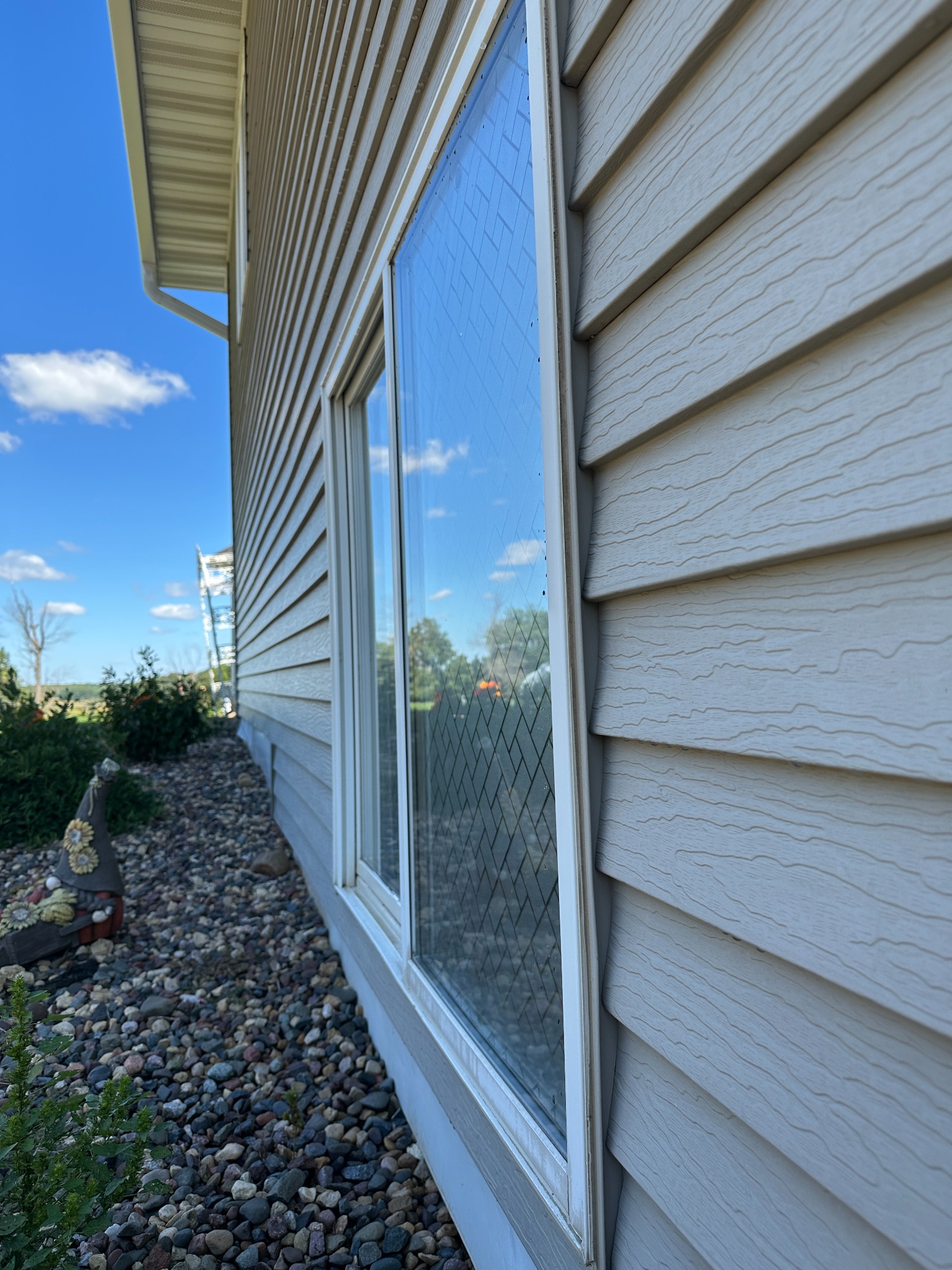 Exterior residential window cleaned by Midwest Power Washing in Western Wisconsin
